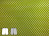 Baumwolljersey apfelgrün mit weißen Punkten 98 bis 122 